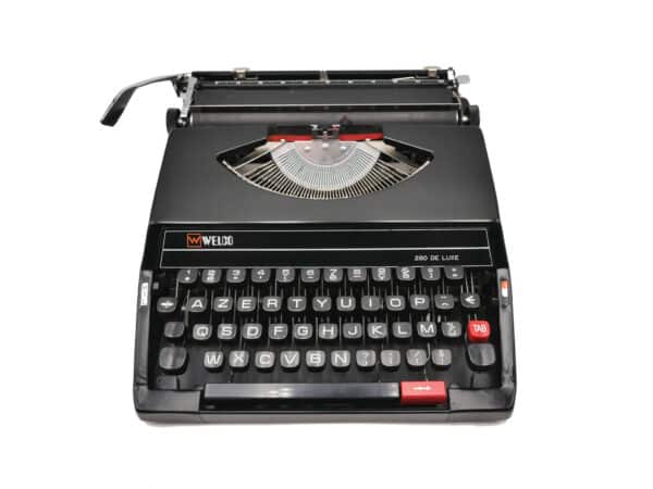 Machine à écrire de Marque Welco modèle 280 De Luxe. Cette machine est en faite produite par Seiko il s'agit de son fameux modèle SR 280 de Luxe.