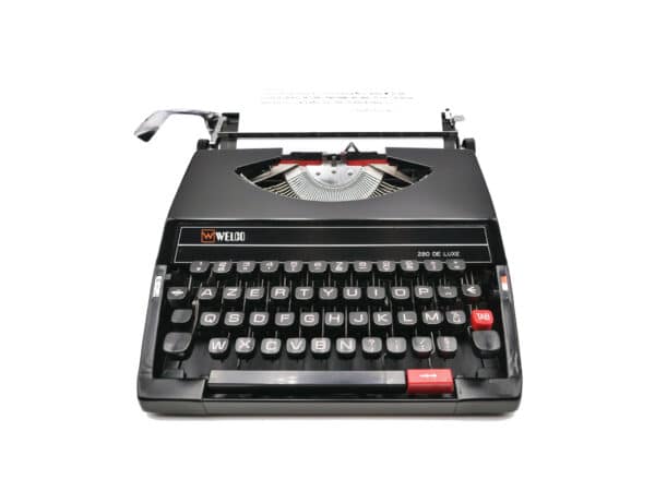 Machine à écrire de Marque Welco modèle 280 De Luxe. Cette machine est en faite produite par Seiko il s'agit de son fameux modèle SR 280 de Luxe.