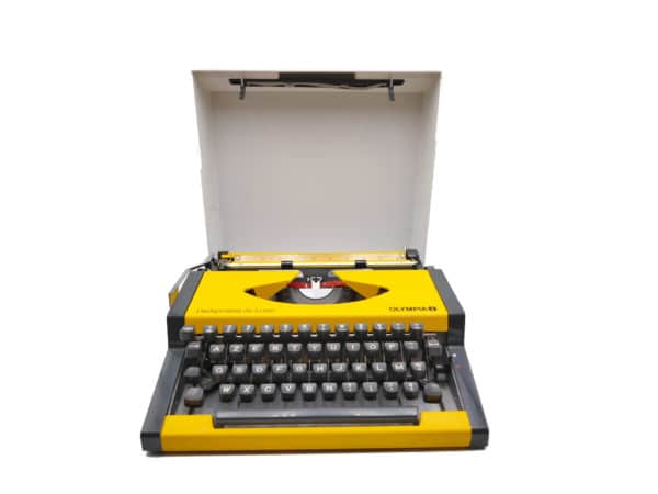 Machine à écrire Olympia Dactymetal De Luxe jaune révisée ruban neuf