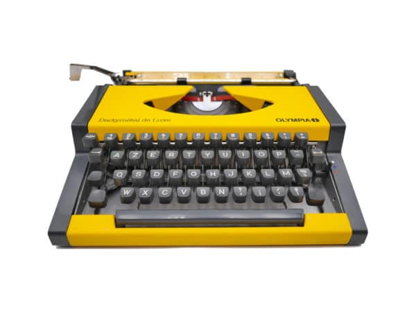 Machine à écrire Olympia Dactymetal De Luxe jaune révisée ruban neuf