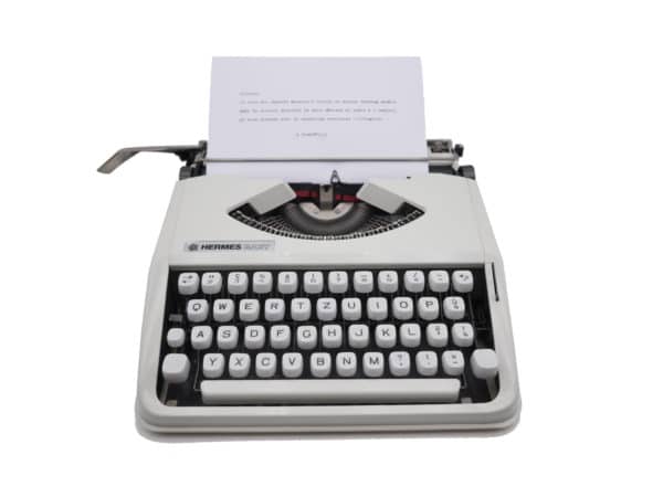 Machine à écrire Hermes baby blanche qwertz suisse révisée ruban neuf