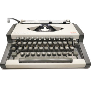 Machine à écrire Olympia AEG Dactymétal grise révisée ruban neuf