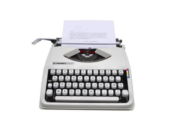 Machine à écrire Hermes Baby blanche Cursive révisée ruban neuf