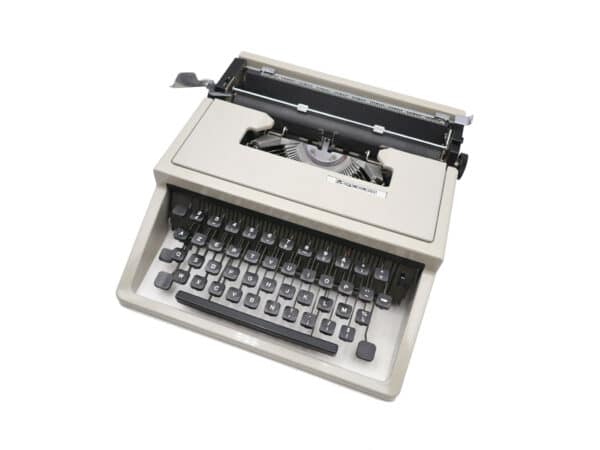 Machine à écrire Mercedes grise révisée ruban noir neuf