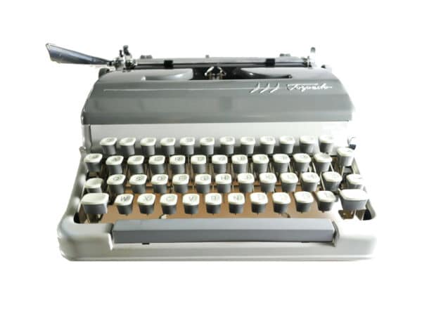 Machine à écrire vintage grise révisée ruban neuf Torpedo 18S
