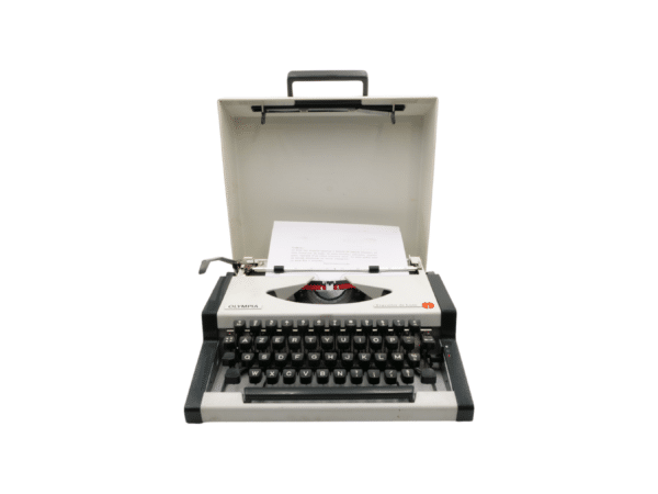 Machine à écrire Olympia Traveller de Luxe blanche et noire